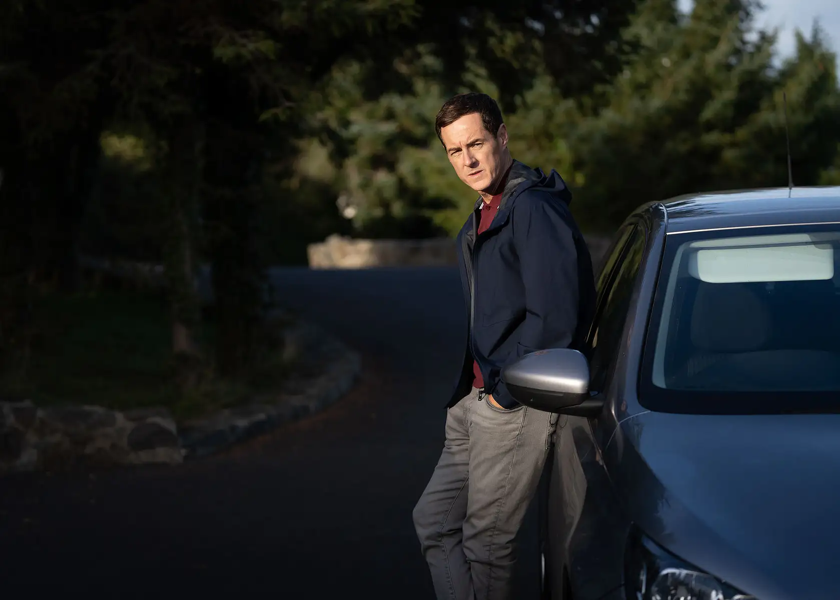 Unit still photograph 0016 with character-led behind-the-scenes look